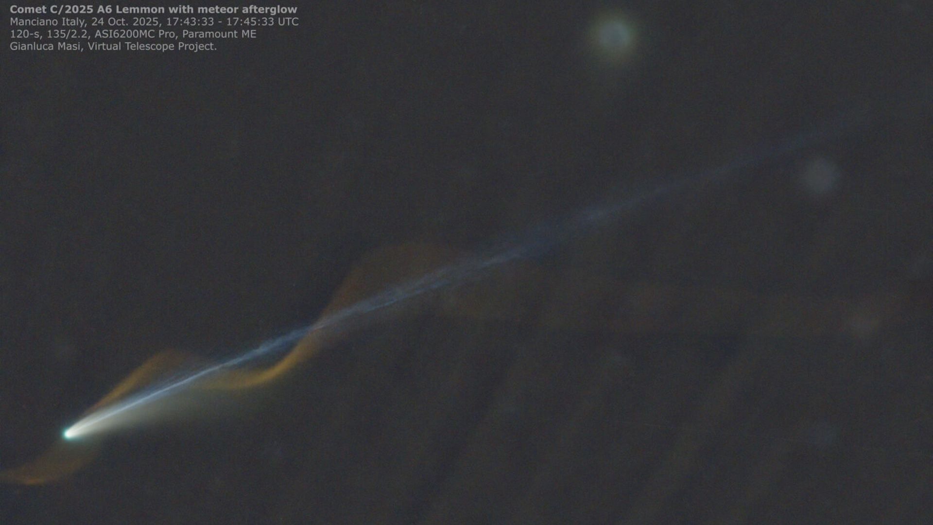 'Miracle' photo captures Comet Lemmon and meteor seemingly entwined over Earth